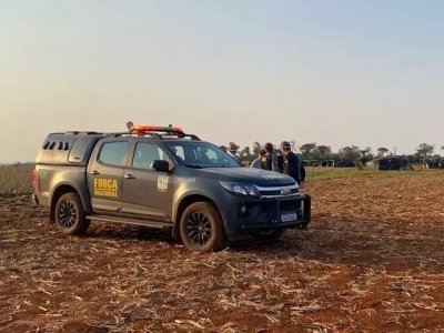 Homens da Fora Nacional em rea ocupada por indgenas no municpio de Douradina (Foto: Divulgao)