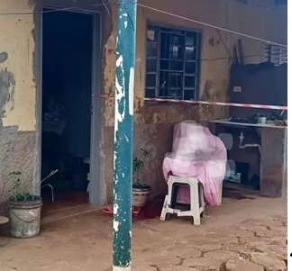 Corpo da v�tima coberto por len�ol. (Foto: Cen�rio MS)