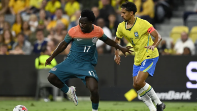 Marquinhos marca Irankunda, da Austr�lia, em amistoso (Foto: Divulga��o/@Socceroos)